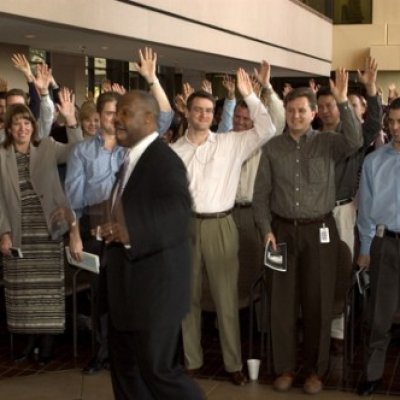 Kendall celebrating as crowd raises hands