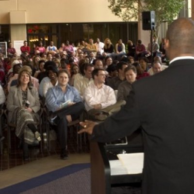 Kendall speaking to a congregation